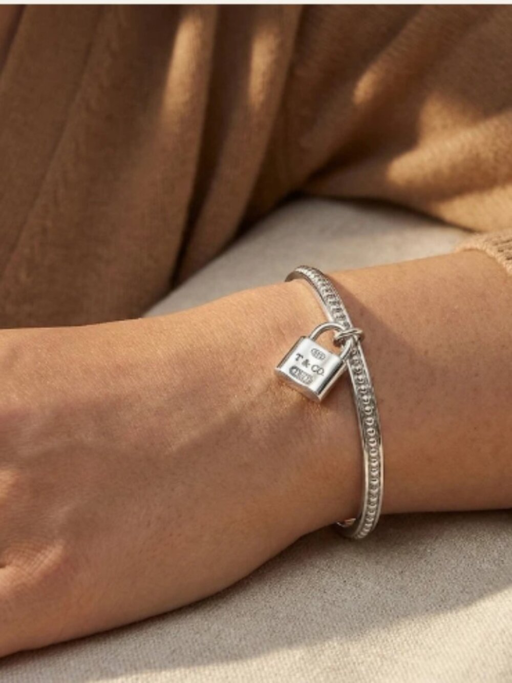 Tiffany & Co. Sterling Silver Beaded Bangle with 1837 Padlock Charm